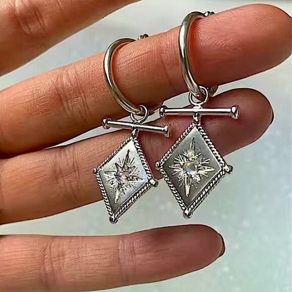 Silver North Star Starburst Zircon Dangle Drop Earrings - Picture 3 of 6